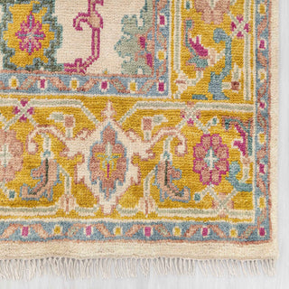 Modern hand-knotted rug with intricate floral pattern in ivory, mustard, teal, magenta, 8x10.