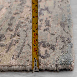 Modern hand-knotted rug with organic abstract pattern in beige, brown, olive, ideal for minimalist living rooms