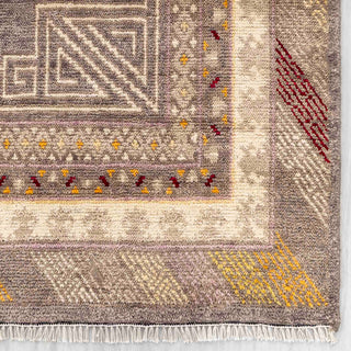 Modern hand-knotted rug with traditional Oushak-inspired geometric floral pattern in warm brown, beige, gold, ideal living room.