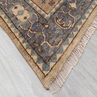 Modern hand-knotted rug with traditional Oushak pattern in neutral beige and blue palette, ideal for spacious classic interiors