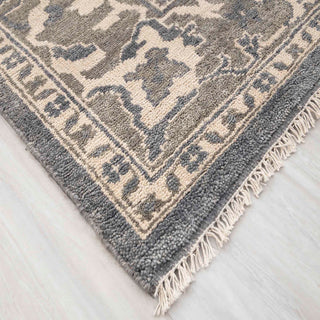 Modern hand-knotted rug with traditional floral pattern in grey and ivory palette, 8x10.