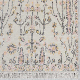 Modern hand-knotted runner with linear floral pattern in soft ivory, blush, gold pastels.