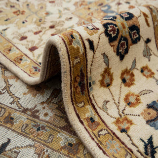 Modern hand-knotted wool rug with flowing floral pattern in ivory, beige, blue and brown, durable 8x10 Persian area rug