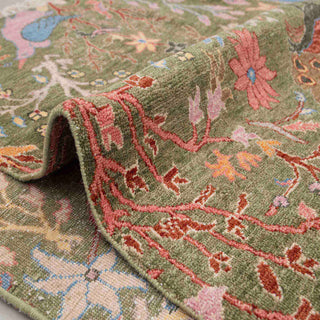 Olive green bird-and-floral wool rug, 6x9 ft living room carpet, soft pile, decorative fringe finish