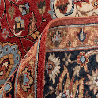 Oriental hand-knotted wool rug in brick red with ivory medallion and navy border accents, 8x10 size ideal for formal living rooms