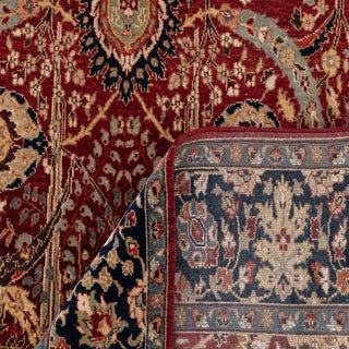 Oriental hand-knotted wool rug in red with ivory and navy floral accents, versatile 6x9 size for dining or sitting rooms.