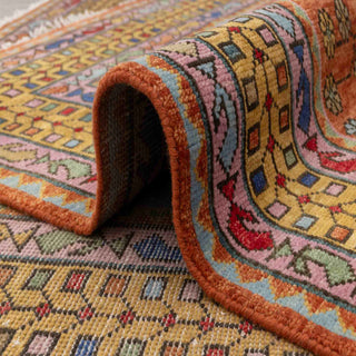 Oriental wool rug, terracotta field with blue corners, floral rosettes, multi-border design, ideal living room