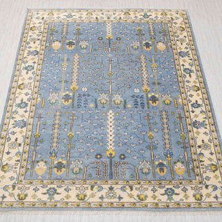 Oushak-style hand-knotted rug in blue and ivory with floral garden design, ideal 6x9 décor
