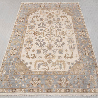 Oushak-style hand-knotted rug in ivory, blue, taupe with floral medallion design, 10x14