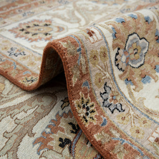 Oushak-style hand-knotted rug with palmette floral motif in rust ivory teal, 10x14 area.
