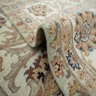Oushak-style hand-knotted rug with palmette floral motif in seafoam ivory rust, 9x12 area.