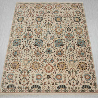 Oushak hand-knotted rug in ivory, blue, and tan with allover floral vine design, 8x10 size.