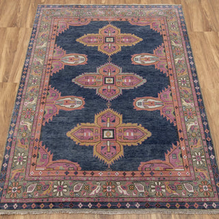 Oushak hand-knotted rug in navy and pink with bold medallion design, ideal 5x8 rooms.