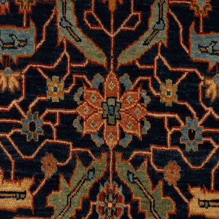 Persian-style hand-knotted rug with Kazak-inspired geometric motifs in navy, rust, teal, and gold, versatile area