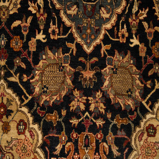 Persian-style hand-knotted rug with Mahal-inspired floral motifs in black, burgundy, tan, and teal, grand 10x14 area.