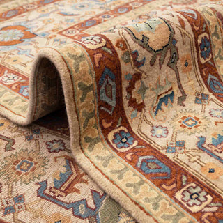 Persian-style hand-knotted rug with classic floral motifs in tan, rust, teal, and gold, versatile 9x12 living room area
