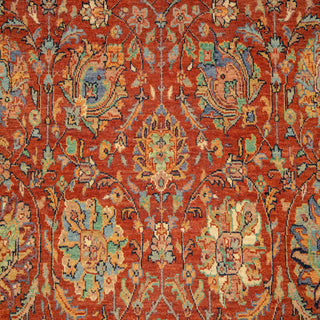 Persian-style hand-knotted rug with detailed floral motifs in rust, blue, gold, and cream, room-size 6x9 area.