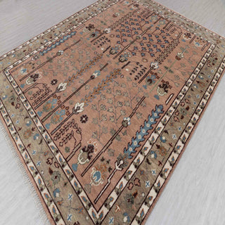 Persian-style hand-knotted rug with tree-of-life prayer motif in terracotta and green tones, 8x10