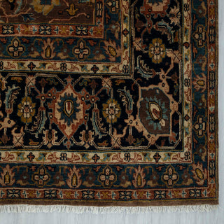 Persian-style hand-knotted wool rug with classic floral and palmette motifs in earthy brown and blue tones