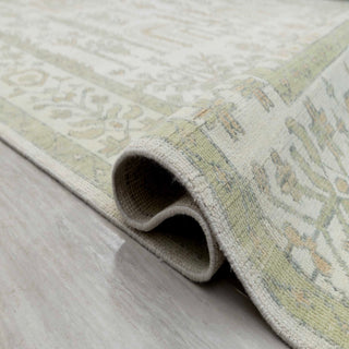 Persian-style tree-of-life hand-knotted rug with vertical garden motifs in ivory and soft green tones, 9x12