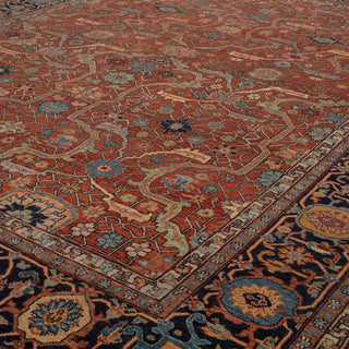 Persian Heriz-style hand-knotted rug with geometric medallion motifs in rust, blue, cream, 8x10