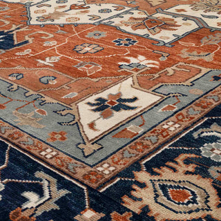Persian Heriz-style hand-knotted rug with tribal geometric and floral motifs in rust, blue, cream tones, 12x15.