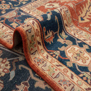 Persian Heriz style hand-knotted rug with tribal allover motif in terracotta, navy, camel colors