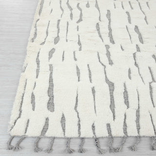 Scandinavian style hand-knotted rug with abstract line motif in cream and soft grey tones