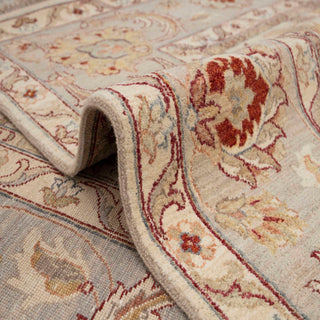 Soft 8x10 oriental wool area rug, ivory field, framed border, durable low-pile for living or dining