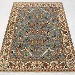 Traditional_hand-knotted_rug_in_blue_ivory_rust_and_gold_with_Persian_floral_medallion_design_8x10_size.
