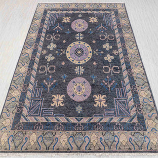 Traditional hand-knotted rug in charcoal, pink, gold with round medallion design, 9x12 area