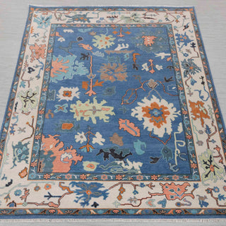 Traditional hand-knotted rug in deep blue, ivory, coral with bold modern Oushak floral design, 8x10.