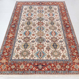 Traditional hand-knotted rug in ivory, rust, teal, and navy with geometric Kazak design, grand 10x14 size