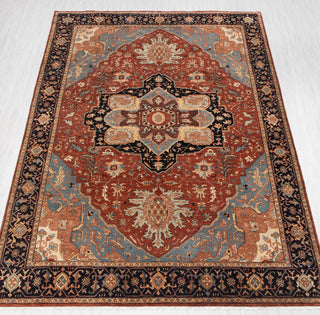 Traditional hand-knotted rug in rust, blue, ivory, and black with bold Heriz medallion design, 8x10 size
