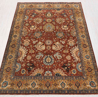 Traditional hand-knotted rug in rust, ivory, and teal with dense Persian floral design, classic 8x10 size.