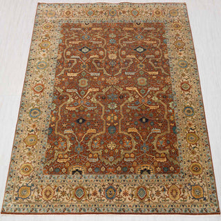 Traditional hand-knotted rug in rust, ivory, and teal with intricate Persian floral design, 8x10 size