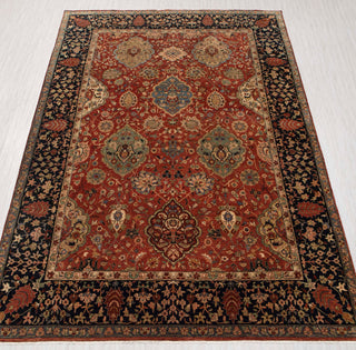 Traditional hand-knotted rug in rust, navy, and beige with Persian floral medallion design, large 10x14 size.