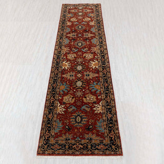 Traditional hand-knotted runner rug in rust, blue, and black with bold Persian floral design, 2.6x10 size.