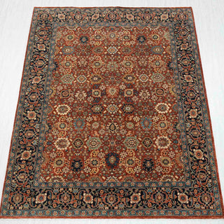 Traditional hand-knotted wool rug in rust, navy, and ivory with allover floral Persian pattern, ideal 8x10 living room size.