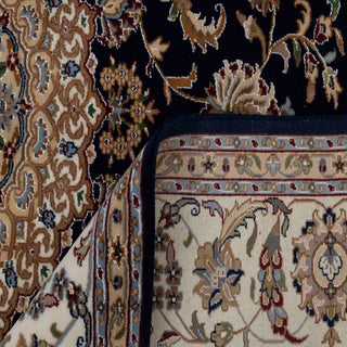 Traditional oriental hand-knotted wool rug, navy field, ivory floral border, room-size 8x10 area