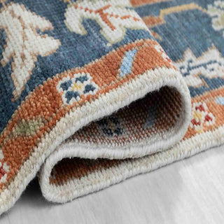 Turkish-style Oushak hand-knotted rug with ivory center, navy teal and rust floral border, large 8x10 living room carpet