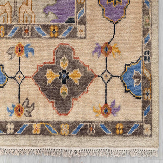 Turkish-style Oushak hand-knotted rug with tribal floral motifs in beige, cobalt blue