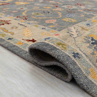 Turkish-style Oushak hand-knotted rug with tribal floral motifs in grey, ivory, and multicolor accents
