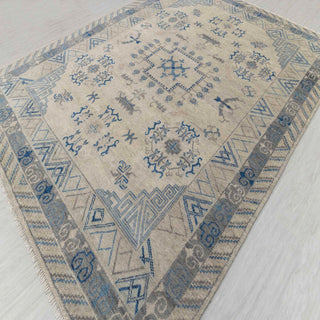 Turkish Oushak-style hand-knotted rug with geometric medallion motifs in washed blue and cream, large 9x12.