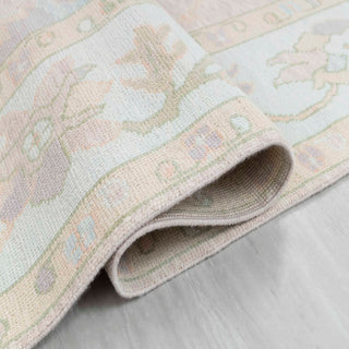 Turkish Oushak-style hand-knotted rug with pastel tribal floral motifs in blush, mint, lilac, 9x12.