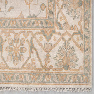 Turkish Oushak hand-knotted rug with palmette and vine motifs in cream, sage, camel tones