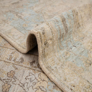 Turkish Oushak hand-knotted rug with vintage-inspired floral motif in beige, blue, tan and cream, 9x12 size.