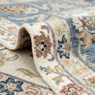 Turkish/Persian Oushak hand-knotted rug with traditional floral scroll motifs in ivory field and soft blue border, 9x12.