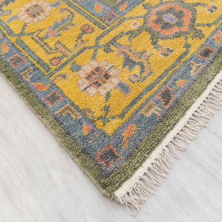 Wool hand-knotted area rug in green and yellow palette, 9x12, durable low pile for living room decor.