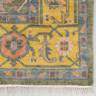 Wool hand-knotted area rug in green and yellow palette, 9x12, durable low pile for living room decor.